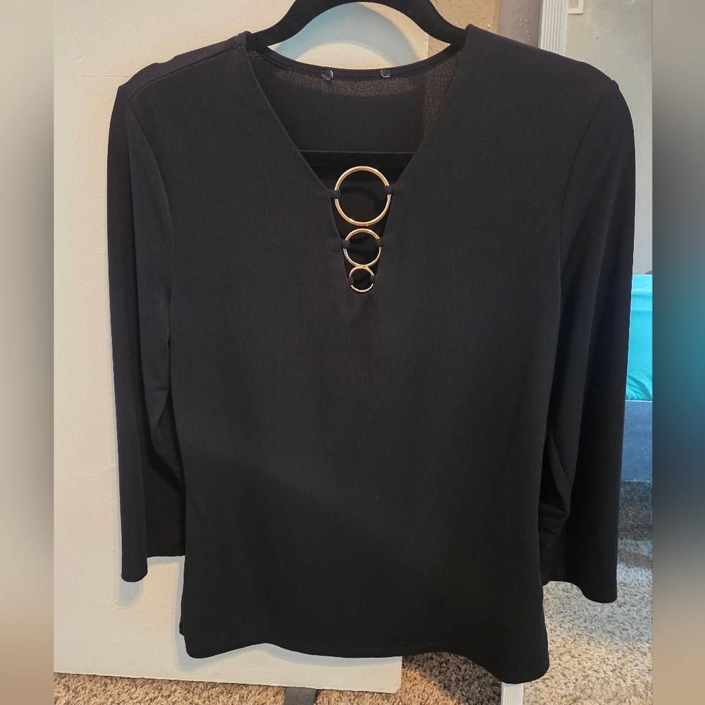 Elegant Black Top with Gold Accents